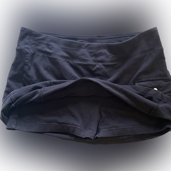 Athletic mini skirt, skort, shorts with cute button pocket and shorts built in - Picture 1 of 9